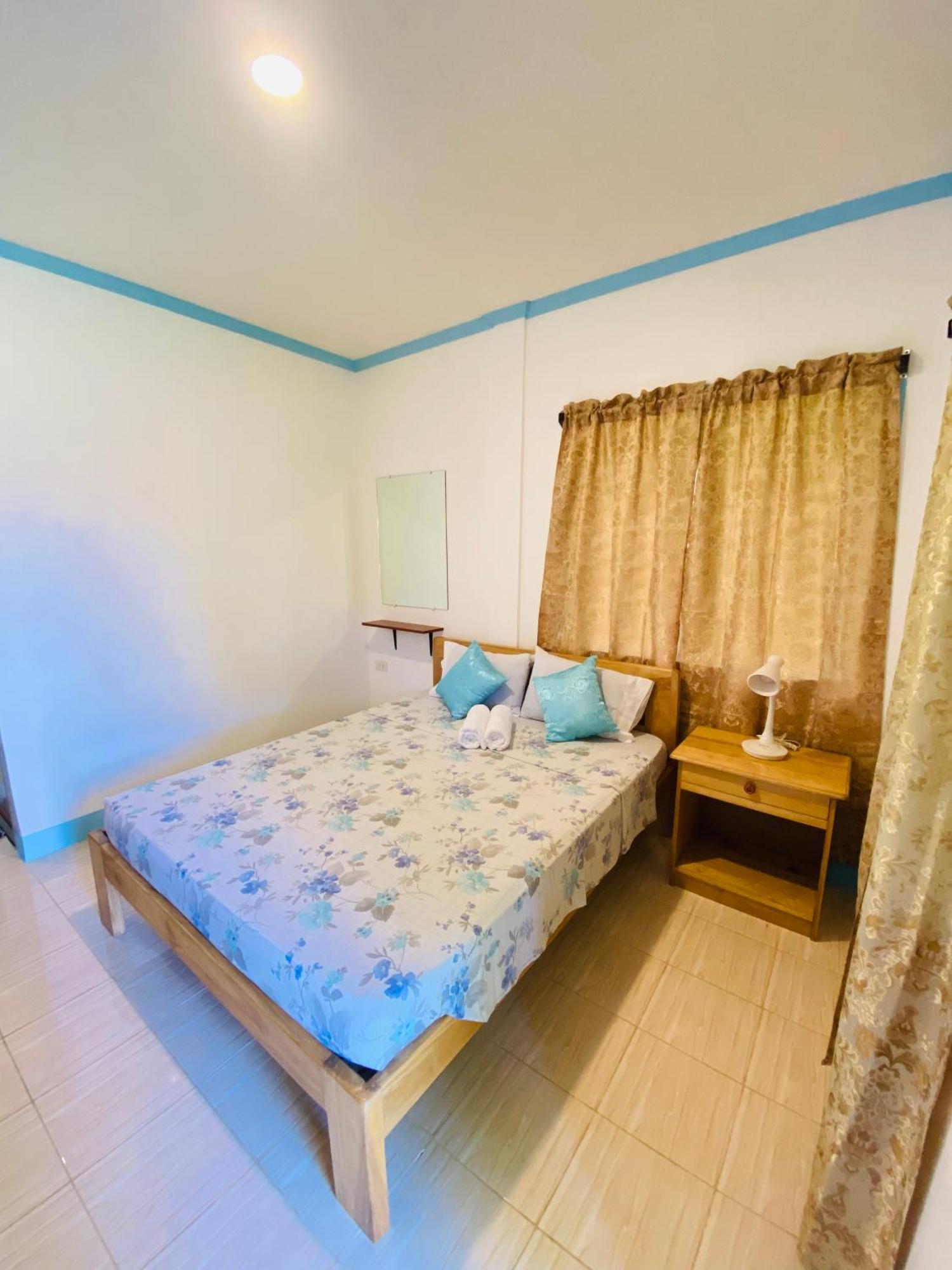 Uptown Guesthouse Siquijor Quarto foto